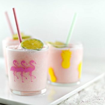DIY Party Drinking Glasses - Flamingo & Pineapple | Create custom designs with your Cricut Explore, like these Flamingo and Pineapple party glasses. Quick and easy home and party ideas. See more on TodaysCreativeLife.com