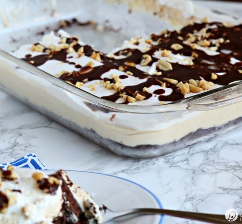 Peanut Butter Chocolate Layered Dessert | This layered Chocolate Peanut Butter Dessert will knock your socks off! Rich and delicious! TodaysCreativeLife.com
