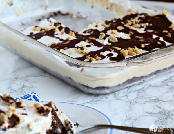 Peanut Butter Chocolate Layered Dessert | This layered Chocolate Peanut Butter Dessert will knock your socks off! Rich and delicious! TodaysCreativeLife.com