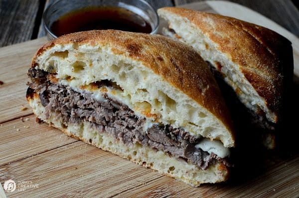 Slow Cooker Roast Beef Dip Sandwiches | This hearty crockpot recipes is for all french dip lovers! Served on a crisp ciabatta roll for extra crunch. Great for family dinners or weekend suppers. Get the recipe on TodaysCreativeLife.com