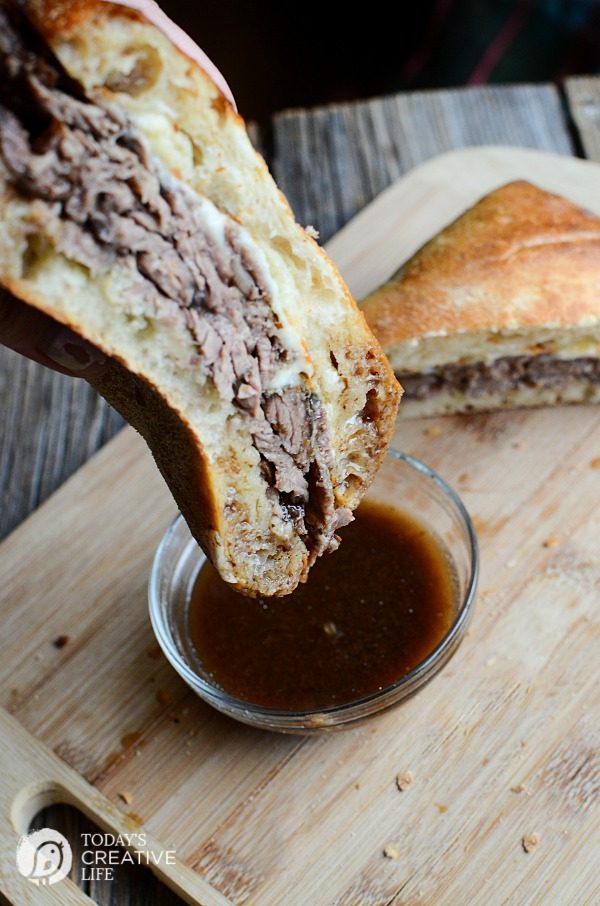 Slow Cooker Roast Beef Dip Sandwiches | This hearty crockpot recipes is for all french dip lovers! Served on a crisp ciabatta roll for extra crunch. Great for family dinners or weekend suppers. Get the recipe on TodaysCreativeLife.com