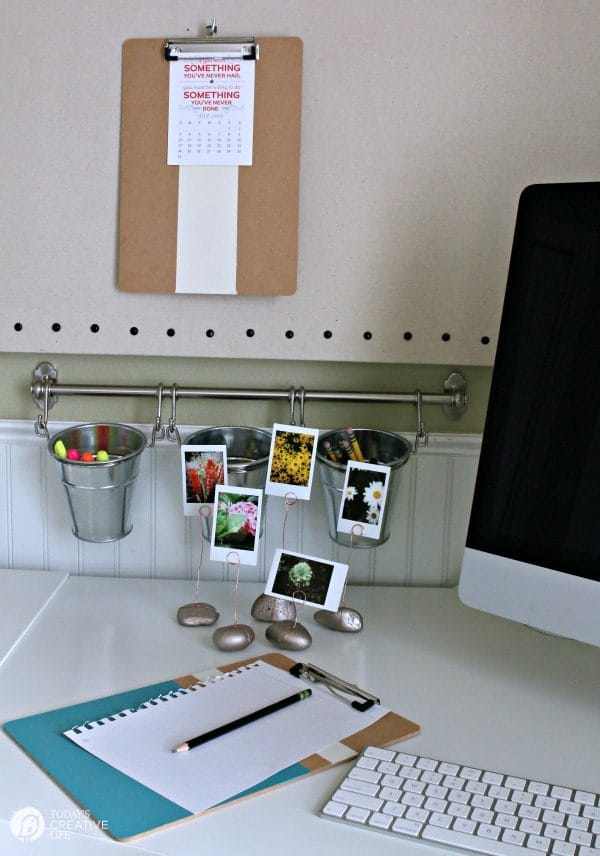 Rock Garden Photo Display |This DIY project is great for displaying any photos. Gather rocks from vacation destinations to display matching vacation photos. Follow my tutorial to make your own. TodaysCreativeLife.com