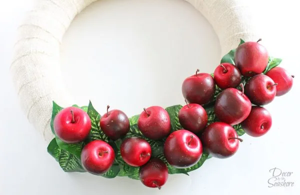 DIY Interchangeable Apple Wreath | Swap out the design each season for a new look. It can be a Fall Wreath, Spring Wreath, Summer Wreath or a Winter Wreath all by changing the apples. See how on Today's Creative Life