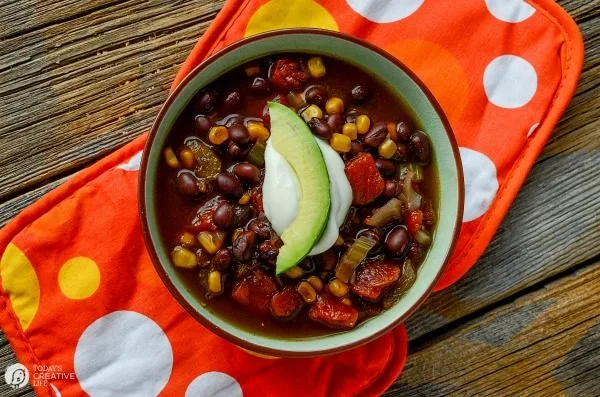 Slow Cooker Black Bean Soup | This satisfying crock pot soup is full of flavor and nutrition! A healthy choice for lunch or dinner! Click the photo for the recipe. TodaysCreativeLife.com