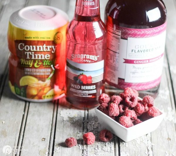 Spiked Raspberry Lemonade Ice Tea | Here's a super quick summer cocktail using a wine cooler as your mixer. Find the recipe on Today's Creative Life