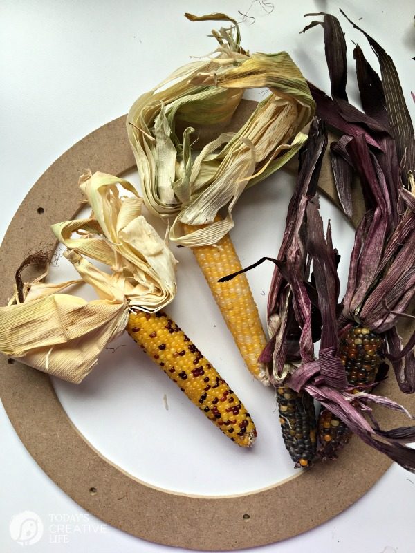 DIY Indian Corn Wreath Fall Porch | make your own fall wreath for inside or out. Click the photo for the tutorial. TodaysCreativeLife.com