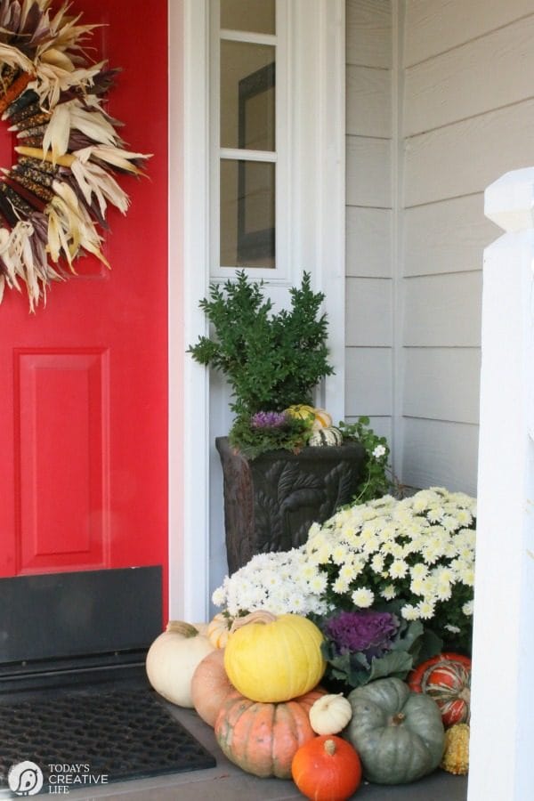 DIY Indian Corn Wreath Fall Porch | Decorate your porch for fall with mums, gourds, pumpkins and this diy fall wreath. Click the photo for more on TodaysCreativeLife.com