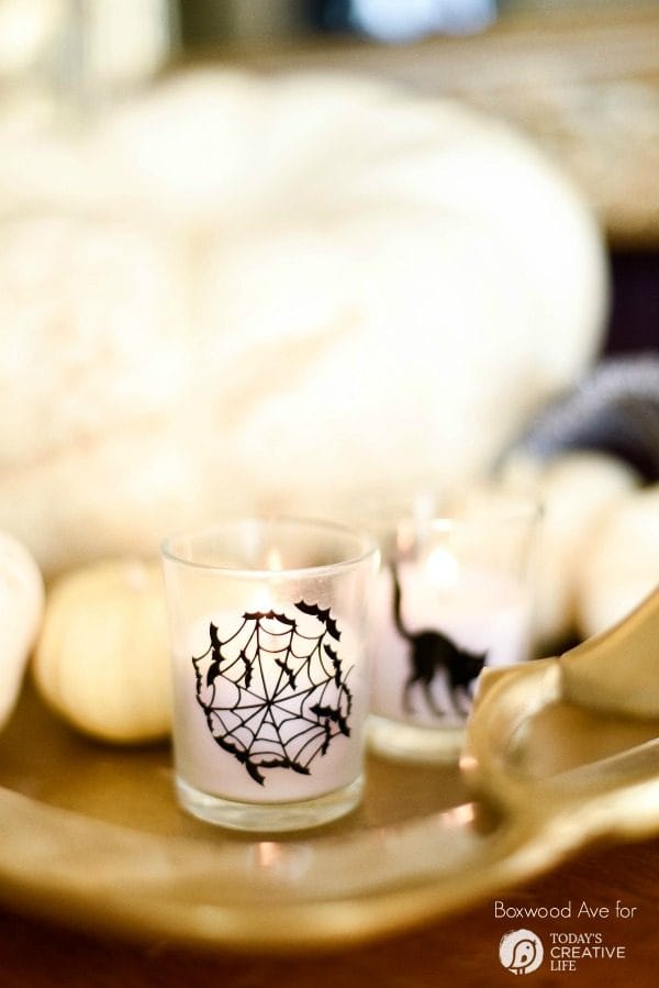 DIY Halloween Votives | Create your own DIY Halloween Decor with this simple craft. Using a Cricut Explore or an Xacto knife for your design. Click the photo for a full tutorial. TodaysCreativeLife.com