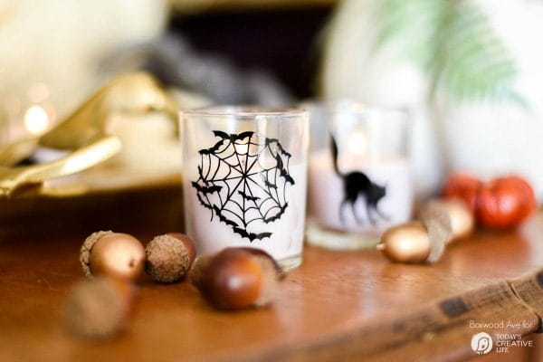 DIY Halloween Votives | Create your own DIY Halloween Decor with this simple craft. Using a Cricut Explore or an Xacto knife for your design. Click the photo for a full tutorial. TodaysCreativeLife.com