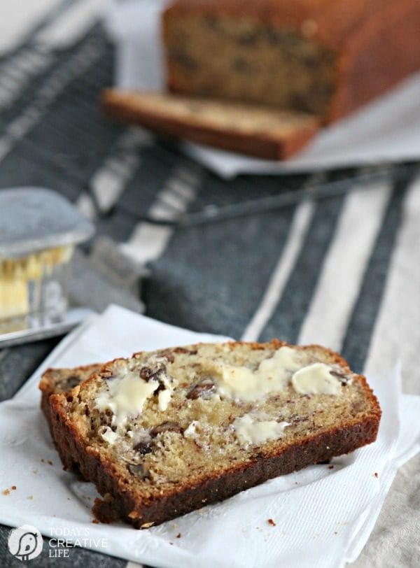 slice of moist banana bread with butter