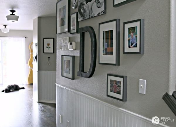 How to Hang a Picture - The Easy Way. Create a picture wall or gallery wall with these easy steps. This hanging picture frame tip will save you time and stress. Click the photo to visit TodaysCreativeLife.com