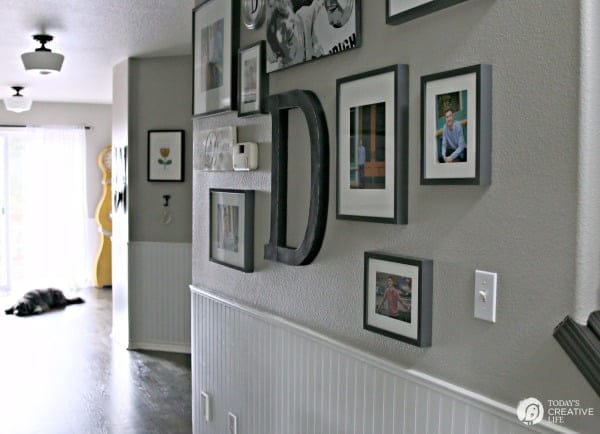 How to Hang a Picture - The Easy Way. Create a picture wall or gallery wall with these easy steps. This hanging picture frame tip will save you time and stress. Click the photo to visit TodaysCreativeLife.com