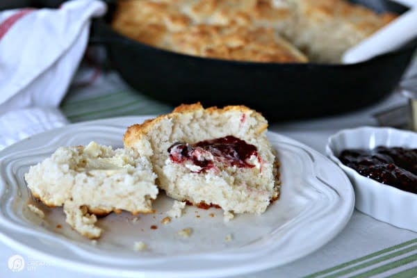 Sliced biscuit with butter and jam. 