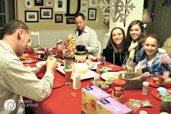 cooking decorating party guests sitting at a table