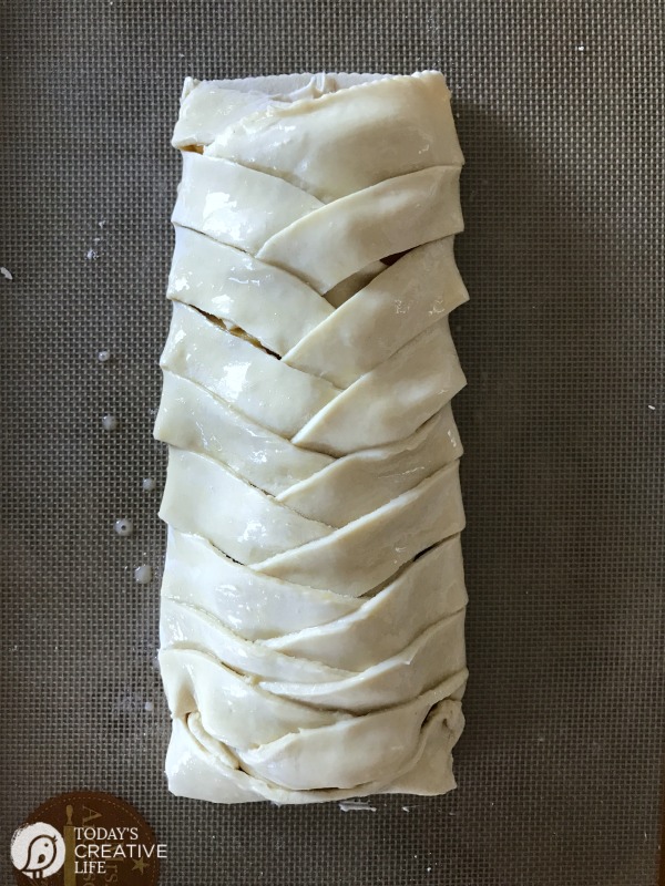 a puff pastry braid dessert, before baking