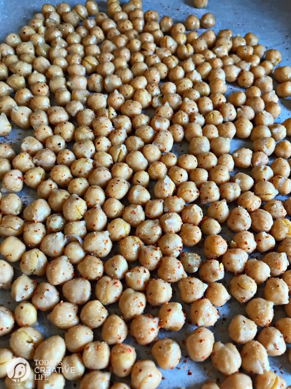Roasted Chickpeas | Healthy, High Protein snacks. Make this crunchy snack spicy, sweet, savory or plain. Easy to make. Click the photo for the recipe. TodaysCreativeLife.com