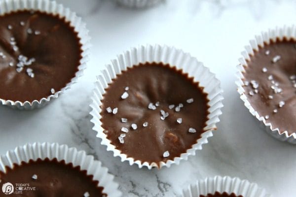 Coconut Oil Chocolate Peanut Butter Bites | Add sea salt for a full rich flavor. TodaysCreativeLife.com