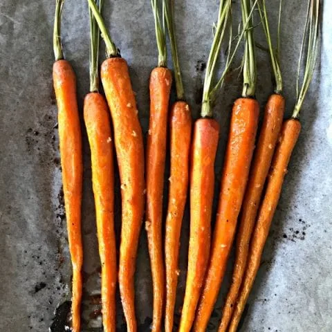 Honey Roasted Carrots with Garlic are savory and sweet. Perfect side dish anytime of year. Holiday side dish, Easter Side Dish, vegetable side dish. Click the photo for the recipe. TodaysCreativelife.com