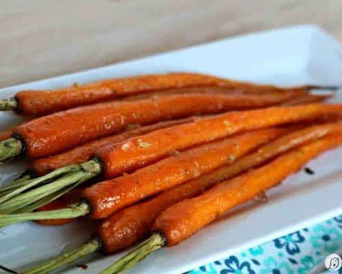 Honey Roasted Carrots with Garlic are savory and sweet. Perfect side dish anytime of year. Holiday side dish, Easter Side Dish, vegetable side dish. Click the photo for the recipe. TodaysCreativelife.com