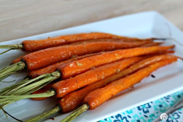 Honey Roasted Carrots with Garlic are savory and sweet. Perfect side dish anytime of year. Holiday side dish, Easter Side Dish, vegetable side dish. Click the photo for the recipe. TodaysCreativelife.com