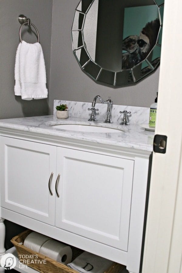 Powder Room Vanities and Ideas | Small Powder room Bathroom makeover. Vanity ideas for a small bathroom. Affordable Carrara Marble top bathroom vanity | See more on Today's CreativeLife.com