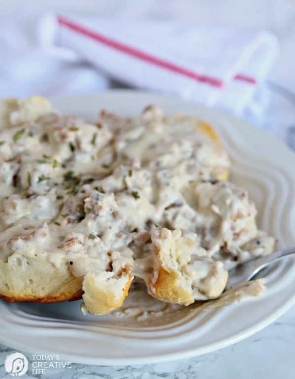 country style sausage gravy over homemade biscuits