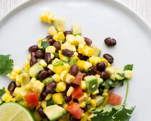 Mexican Black Bean and Corn Salad | Easy Summer Salads and side dish recipes | Fresh Mango, Avocado, tomatoes | WanderSpice.com for TodaysCreativeLife.com