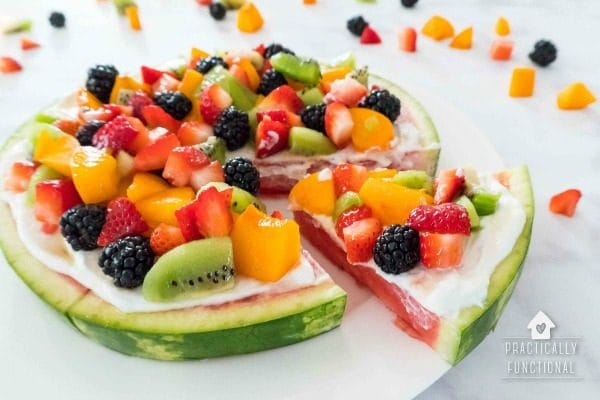 Watermelon Pizza Dessert Recipe topped with yogurt and fruit toppings. Summer desserts make every BBQ better, especially when it's a fruit pizza! Celebrate Summer Series Practically Functional for TodaysCreativeLife.com