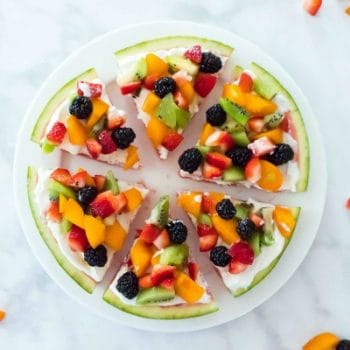 Watermelon Pizza Dessert Recipe topped with yogurt and fruit toppings. Summer desserts make every BBQ better, especially when it's a fruit pizza! Celebrate Summer Series Practically Functional for TodaysCreativeLife.com