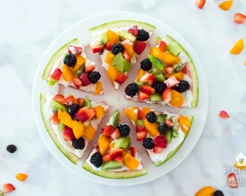 Watermelon Pizza Dessert Recipe topped with yogurt and fruit toppings. Summer desserts make every BBQ better, especially when it's a fruit pizza! Celebrate Summer Series Practically Functional for TodaysCreativeLife.com