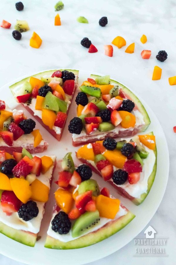 Watermelon Pizza Dessert Recipe topped with yogurt and fruit toppings. Summer desserts make every BBQ better, especially when it's a fruit pizza! Celebrate Summer Series Practically Functional for TodaysCreativeLife.com