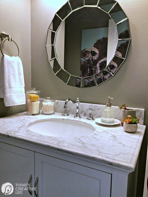 small bathroom vanity and mirror