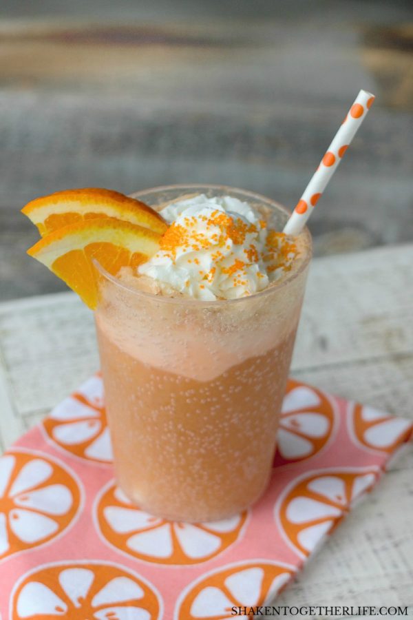 Creamsicle Float Recipe | This float made with Orange Sherbet, Cream Soda and Whipped Cream tastes like summer! Frozen slushy drinks. Easy to make. Shaken Together for TodaysCreativeLife.com