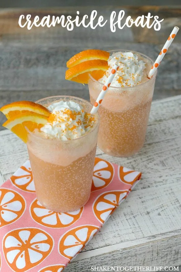 Creamsicle Float Recipe | This float made with Orange Sherbet, Cream Soda and Whipped Cream tastes like summer! Frozen slushy drinks. Easy to make. Shaken Together for TodaysCreativeLife.com