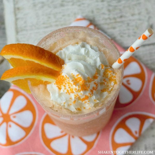 Creamsicle Float Recipe | This float made with Orange Sherbet, Cream Soda and Whipped Cream tastes like summer! Frozen slushy drinks. Easy to make. Shaken Together for TodaysCreativeLife.com