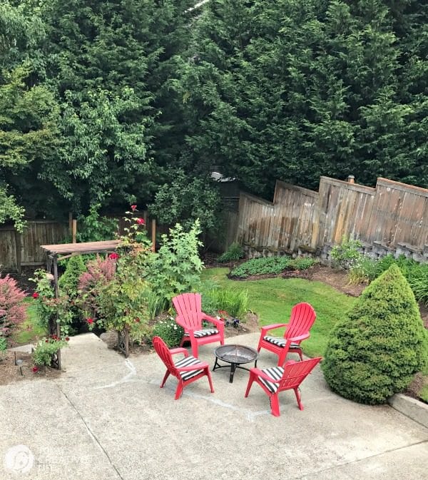 homemade Adirondack chairs around a fire pit