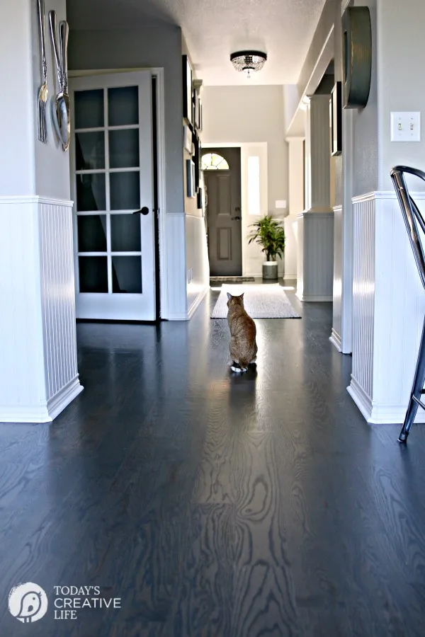 Best Wood Floor Cleaner Non-Toxic | Why you should never clean hardwood floors with vinegar! How to Clean Hardwood flooring. Shiny and no dull floors. TodaysCreativelife.com hardwood floors in a home
