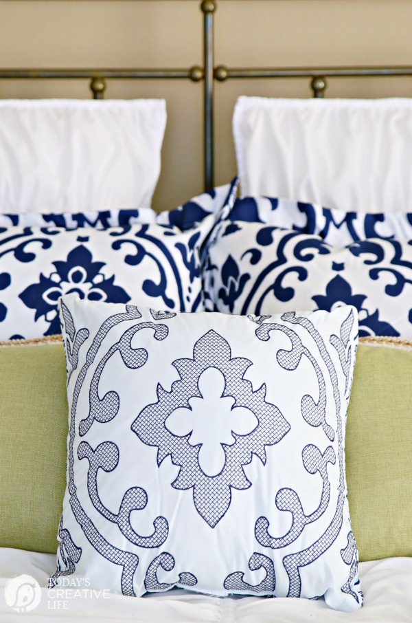 Guest Bedroom Ideas on a Budget | Cheap decorating ideas for small bedrooms | Inexpensive Blue and white comforter bedding. Room makeover. Decorating Ideas from TodaysCreativeLife.com Sponsored by BHGLIvebetter.
