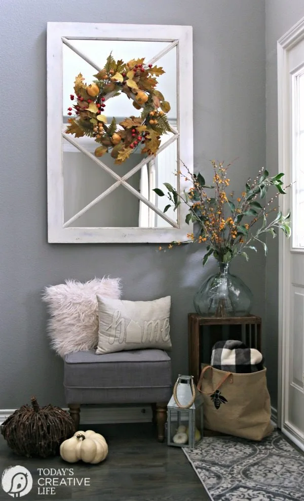 Small Entryway Decorating Ideas | Small entryway bench and decor | TodaysCreativeLife.com