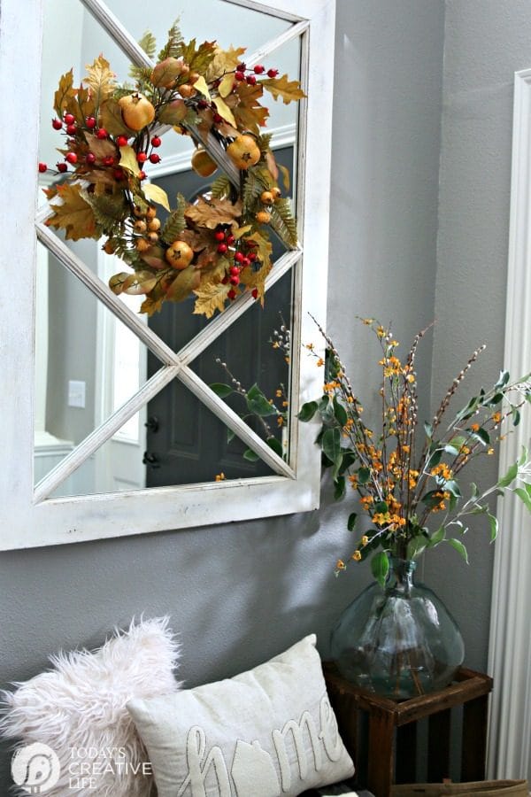 Small Entryway Decorating Ideas | Small entryway bench and decor | TodaysCreativeLife.com