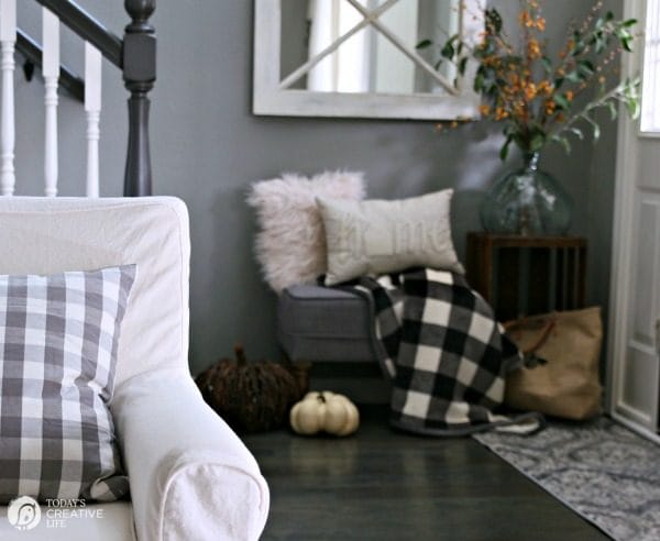 Small Entryway Decorating Ideas | Small entryway bench and decor | TodaysCreativeLife.com