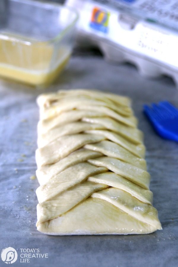 a braided puff pastry dessert, before baking