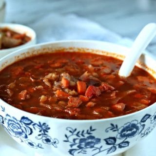 Red Cabbage Kielbasa White Bean Soup | Hearty Soup Recipes for easy dinner ideas. Simple vegetable soup with kielbasa sausage | Click for the recipe on TodaysCreativeLife.com AD #AuntNelliesSweetSourCabbage