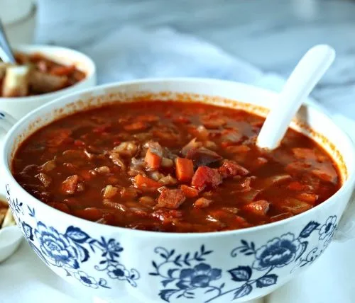 Red Cabbage Kielbasa White Bean Soup | Hearty Soup Recipes for easy dinner ideas. Simple vegetable soup with kielbasa sausage | Click for the recipe on TodaysCreativeLife.com AD #AuntNelliesSweetSourCabbage