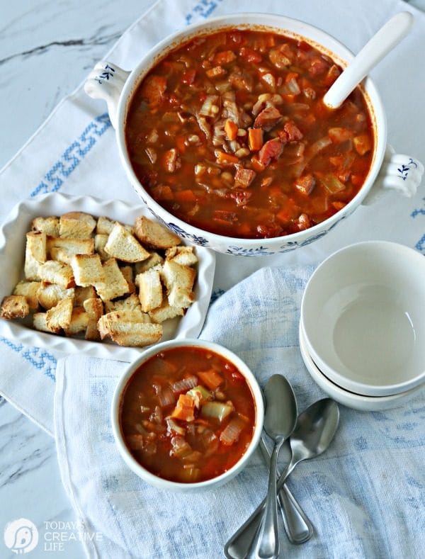 Red Cabbage Kielbasa White Bean Soup | Hearty Soup Recipes for easy dinner ideas. Simple vegetable soup with kielbasa sausage | Click for the recipe on TodaysCreativeLife.com AD #AuntNelliesSweetSourCabbage 