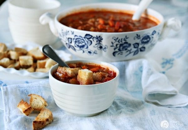 Red Cabbage Kielbasa White Bean Soup | Hearty Soup Recipes for easy dinner ideas. Simple vegetable soup with kielbasa sausage | Click for the recipe on TodaysCreativeLife.com AD #AuntNelliesSweetSourCabbage 