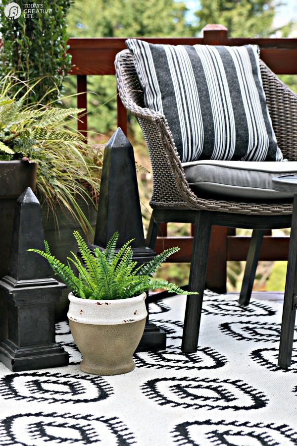 small patio accents - chairs and potted plants