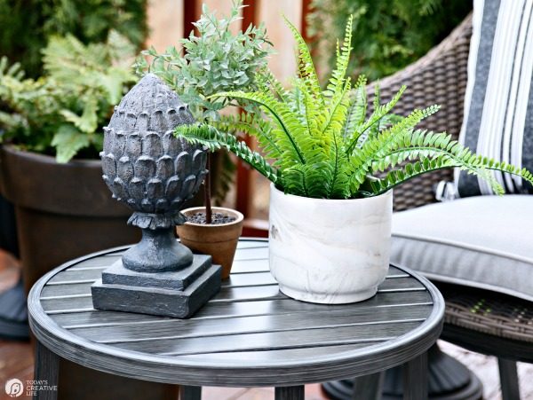 pretty table accent pieces on an outdoor patio table