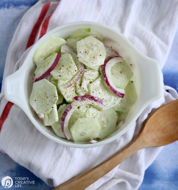 Sour Cream Cucumber and Onion Salad in a bowl