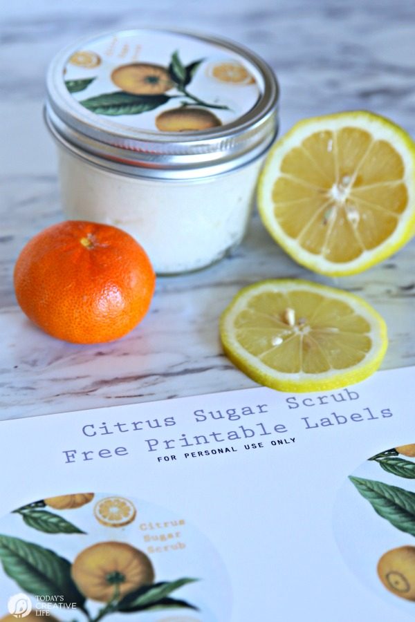 homemade citrus scented body scrub in a jar.